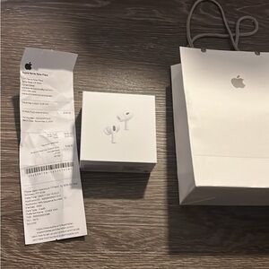 Apple AirPods Pro with White Bag and Receipt